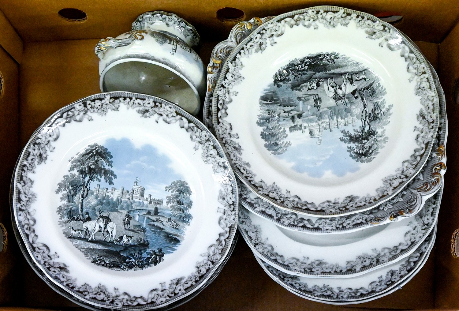 A Victorian earthenware transfer printed dinner service, decorated with scenes of Windsor Castle