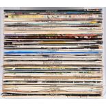 A collection of vinyl LP records, including Neil Diamond, Tony Bennett, James Taylor, John Denver,
