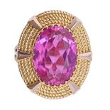 A pink stone cocktail ring, probably French, mid 20th c, in gold, 11.4g, size K Now apparently