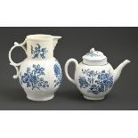 A Worcester blue and white teapot and a cover and cabbage leaf moulded mask jug, c1770 and c1780,