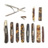 Ten various folding knives, with tortoiseshell or other scales, late 19th c and later, one slide-