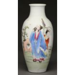 A Chinese famille rose vase, third quarter 20th c , enamelled with a couple, 23cm, Qianlong mark
