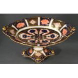 A Royal Crown Derby Imari pattern fruit stand, 1940, with pierced acorn handles and feet, 27cm l,