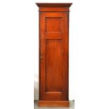 A Victorian mahogany wardrobe, of unusually narrow proportions, with twin panelled door, 198cm h; 51