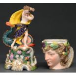 A Derby Bacchus mug, c1800,  with gilt handle, 93mm h and Derby figure of Neptune with a dolphin,