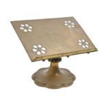 A Victorian gothic brass bible lectern,  engraved with the sacred monogram, on scallop foot, 35.5cm,