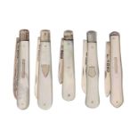 Five Victorian and George V silver fruit knives with mother of pearl scales, various lengths,