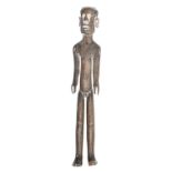 Tribal art. A carved wood male doll, traces of white pigment, 30.5cm h Feet damaged