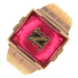 A red paste signet ring, in gold, with the initial N, indistinctly inscribed and marked 10k, 4.7g,
