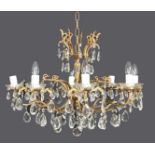 An eight-branch giltmetal and glass chandelier, 75cm w Some losses
