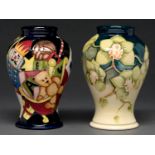 Two Moorcroft vases, 2001 and 2012, in a Christmas or floral pattern, 15.5cm h, impressed and