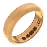 An 18ct gold wedding ring, marks obscured, 6.3g, size L Worn