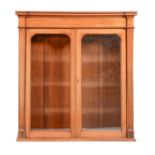 A Victorian mahogany bookcase, the pair of glazed doors flanked by fluted pilasters, 139cm h; 31 x
