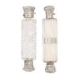 Two Victorian silver capped combined scent and salts bottles, 12.5cm l One of the two caps on one