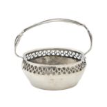 An Art Nouveau pierced silver sugar bowl, with wirework handle, 10.5cm h, marks rubbed, London 1900,