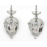 A pair of cut glass corridor chandeliers and set of four wall lights, 20th c, chandeliers 30cm h
