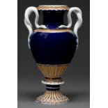 A Meissen snake handled vase, 19th c, the blue ground between fluted gilt borders, 26cm h,