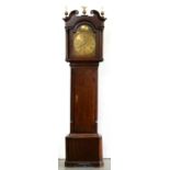 A George III eight day oak longcase clock, South Wales, M Thomas Carnarvon, with breakarched,