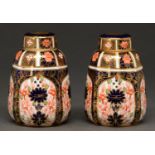 A pair of Royal Crown Derby Imari pattern sack shaped jars and covers, 1921 and 1922, 10cm h,