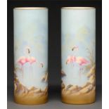 A pair of Royal Worcester cylindrical vases, 1921, painted by G Johnson, both signed, with flamingos