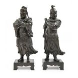 A pair of Chinese bronze sculptures of warriors, 19th c, on rectangular base, even dark brown