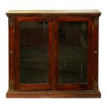 A Victorian rosewood bookcase,  with brass rosette and palmette mounts, 99cm h; 36 x 106cm Top