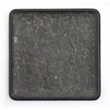 A Chinese carved slate tray, 20th c, with immortals, the underside with phoenix, flowers and scroll,