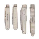 Three William IV - early Victorian silver fruit knives and a fork, with decorated mother of pearl
