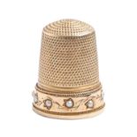 A gold thimble, 19th c, set with split pearls, 21mm, unmarked, 5.8g Good condition