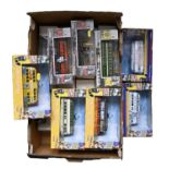 Diecast Vehicles.  An extensive collection of boxed large scale Corgi buses and trams (4 boxes) Good