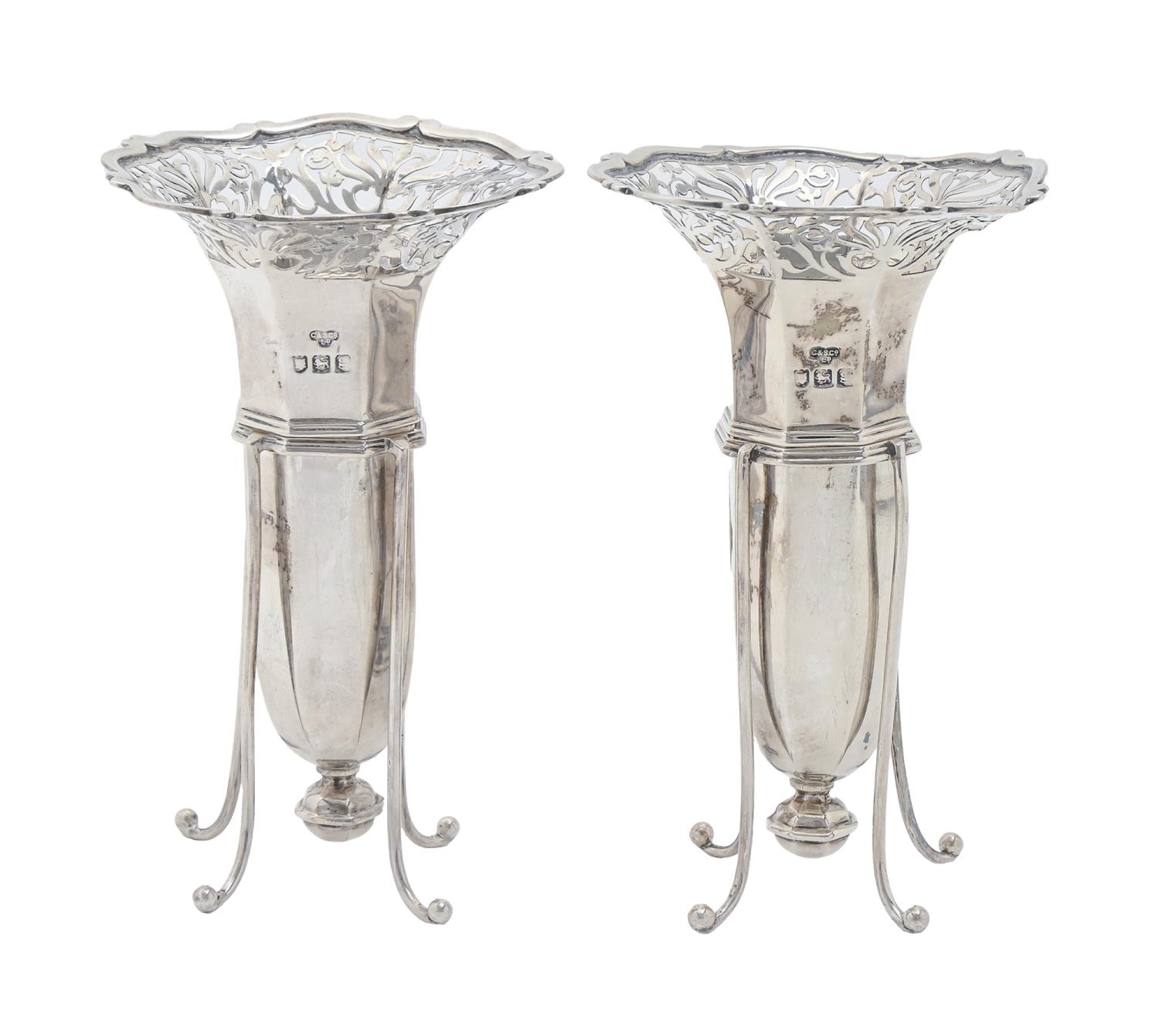 A pair of Edwardian pierced silver vases and wirework stands, 14cm h, by The Goldsmiths &