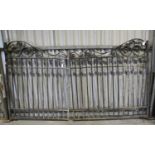 A pair of Victorian wrought iron garden gates, c1900,  170cm h, 279cm l (overall); 124 and 155cm l