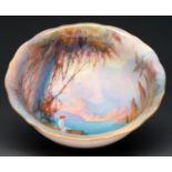 A Royal Worcester bowl, 1929, painted by Sedgley, signed, with a bather on a North Italian