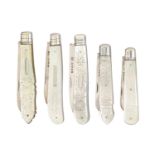 Five Victorian - George V silver fruit knives, with engraved mother of pearl scales, various lengths