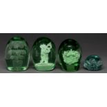 Four Victorian glass dumps, one internally decorated with a boy blowing a horn, another with