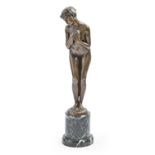 An Art Deco bronze statuette of a young woman, c1930, cast from a model by A Saladin, even gold