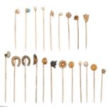 A collection of Victorian and early 20th c gold stickpins, a labradorite terminal of one carved as