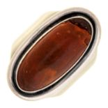 A Danish amber ring, in silver marked 925 COF STERLING, maker's mark obscured, Denmark, 12.6g,