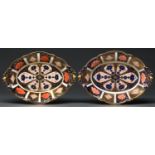 A pair of Royal Crown Derby fruit dishes, 1940, with pierced acorn handles and feet, 29cm l, printed