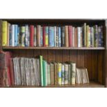 Two shelves of children's books, early 20th c and later, including nine Beatrix Potter titles, all