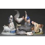 Two Royal Copenhagen figures with animals, a goat and kid and three birds, early 20th c and later,