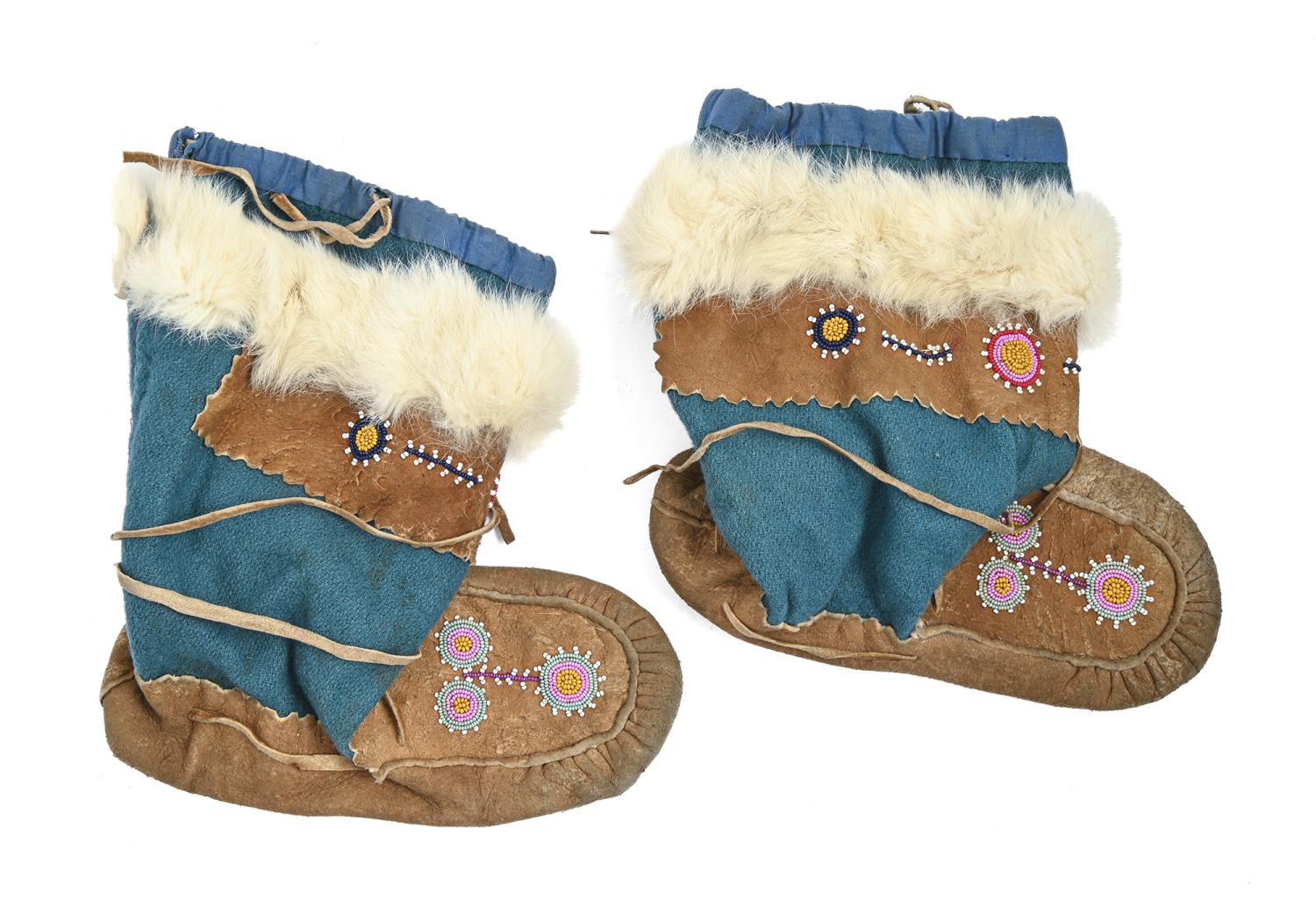 Tribal Art. A pair of native American  leather and beadwork moccasins 20th century Good conditioin