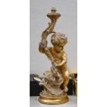 A Baroque inspired gilt and composition table lamp, late 20th c, as a putto, 74cm h  Some wear and