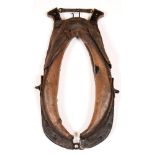 A farming horse collar, 19th c, 95cm l Good condition, signs of use and wear.