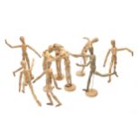 Twelve artist's wooden lay figures from the studio of Derek Carruthers (1935-2021),  49cm and