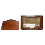 A Bush mahogany wireless radio, c. 1940, 47.5cm w, a mahogany stationery rack, c.1900, 38cm w, (2)