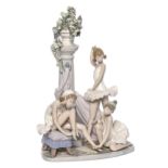 A Lladro group of three ballerinas, 43cm h, printed mark Flowers at top of pillar slightly chipped