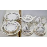 A Royal Worcester June Garland pattern tea service, comprising teapot, milk jug and sugar bowl,