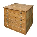 A waxed pine plan chest, with plywood boarded sides, 84cm h; 88 x 101cm
