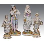 A pair of French painted biscuit porcelain figures of a lady and gallant, late 19th c, on round